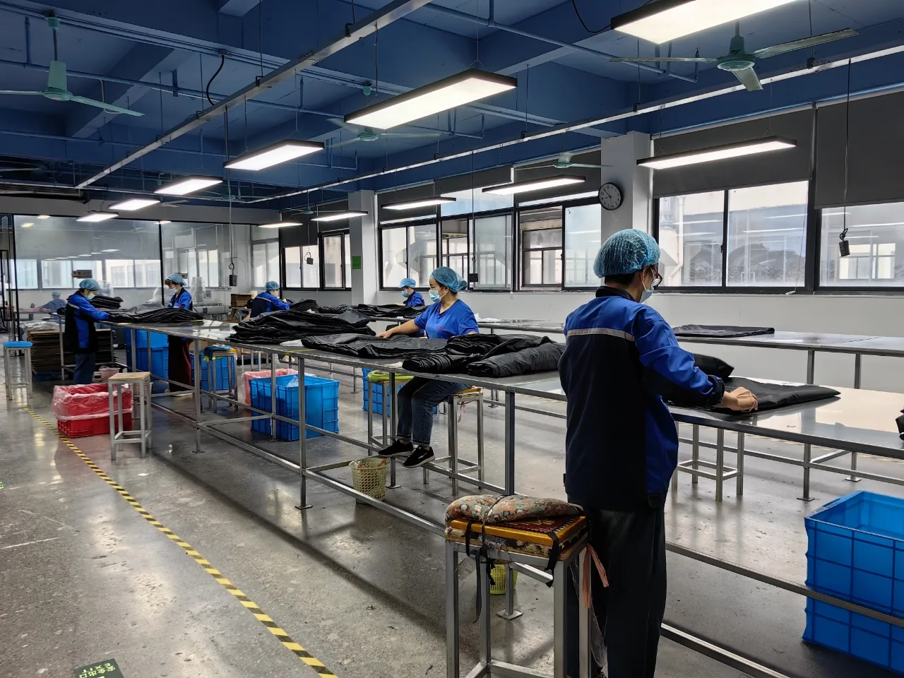 Inspection and finishing of textile packaging at Yuli Bag