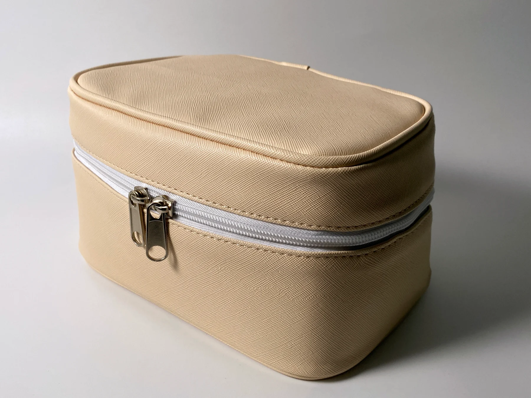 Beige structured custom toiletry organizer with double zipper
