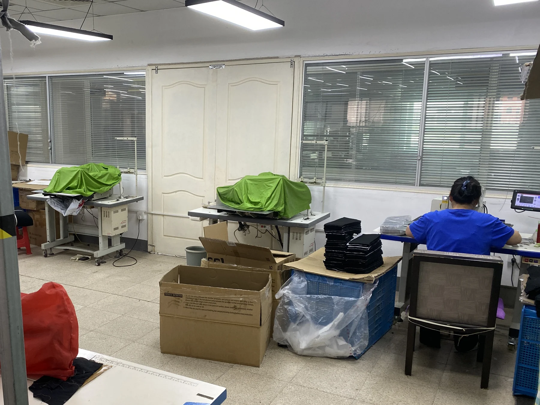 Programmable pattern sewing work area at Yuli Bag's Suzhou site